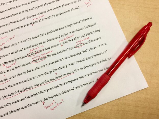 An essay corrected by a marker or teacher