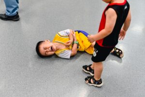 A child crying on the floor